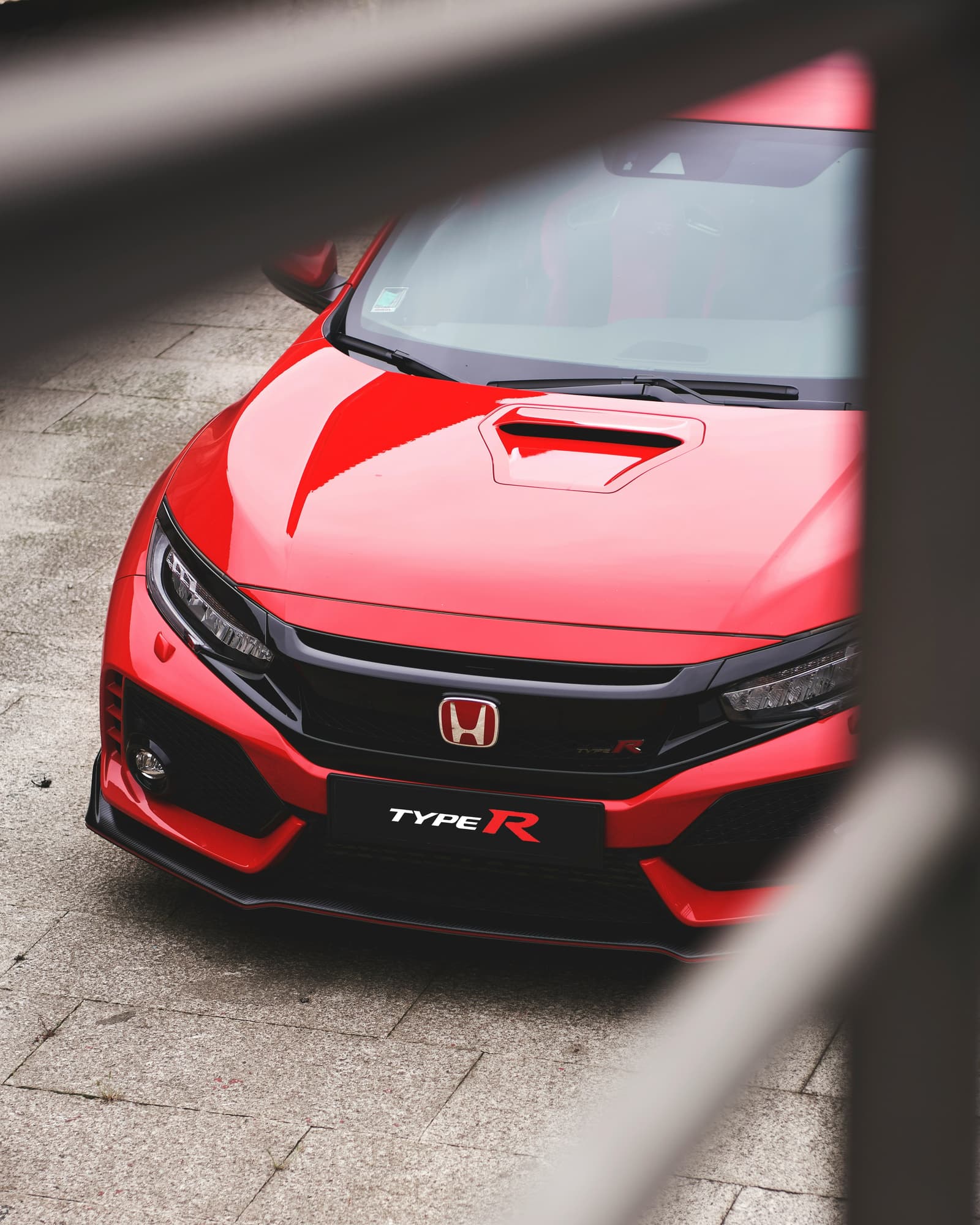 Red Honda Civic Type R sports hatchback viewed from above