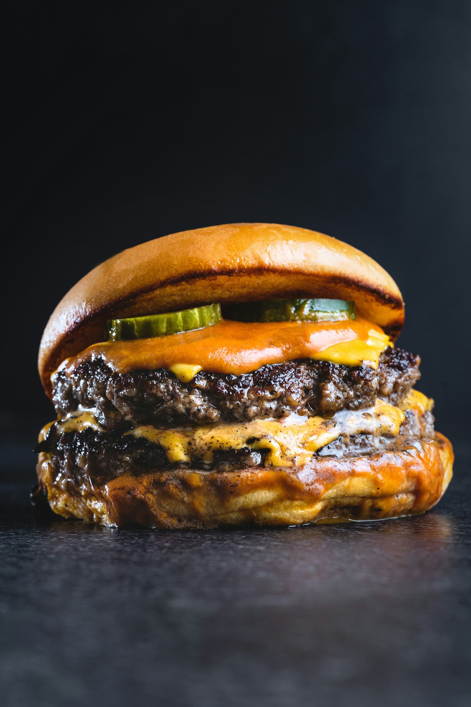 The O.G. Smash - double smash patties with American cheese and pickles