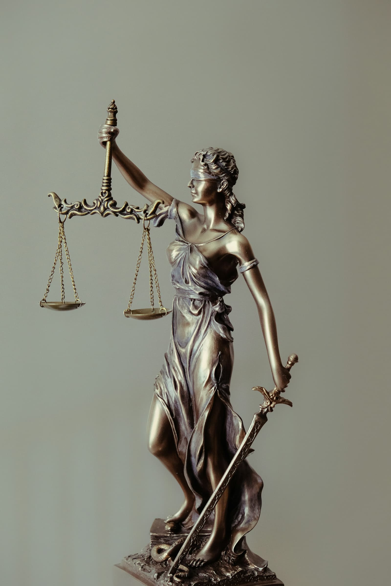 Lady Justice statue holding scales and sword